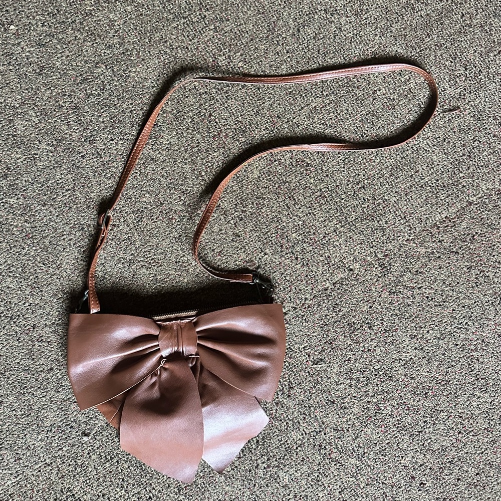 Brown leather crossbody bag with bow detail